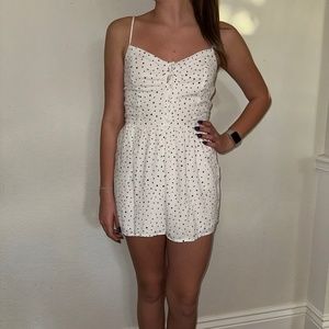 white and black polka dot romper